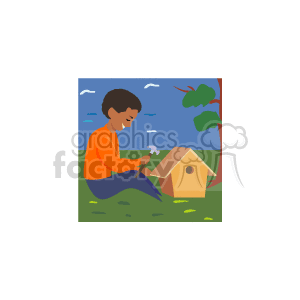 The clipart image features a young African American boy outdoors, building or fixing a birdhouse with a hammer. The setting is a grassy area with a blue sky and a tree branch visible in the background.
