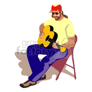 man playing the acoustic guitar