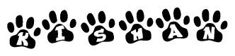 The image shows a series of animal paw prints arranged in a horizontal line. Each paw print contains a letter, and together they spell out the word Kishan.