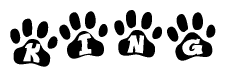 The image shows a series of animal paw prints arranged horizontally. Within each paw print, there's a letter; together they spell King