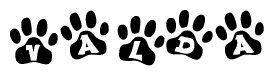 The image shows a row of animal paw prints, each containing a letter. The letters spell out the word Valda within the paw prints.