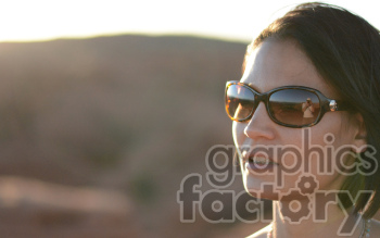 female wearing sunglasses