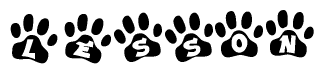 The image shows a series of animal paw prints arranged horizontally. Within each paw print, there's a letter; together they spell Lesson