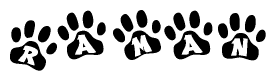 The image shows a row of animal paw prints, each containing a letter. The letters spell out the word Raman within the paw prints.