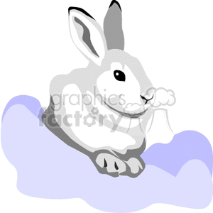 The clipart image features a stylized illustration of a rabbit. The rabbit is depicted in shades of grey and white, giving it a soft and gentle appearance. It appears to be sitting on or nestled within a patch of blue, which might represent snow. The rabbit has large eyes, prominent ears, and appears to be looking to the side with a peaceful expression. 