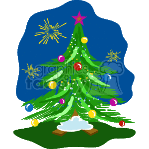 The clipart image features a decorated Christmas tree with a star on top. The tree is adorned with colorful bulbs and is surrounded by a dark blue background accentuated with fireworks or sparkles to give a festive atmosphere. The base of the tree is illustrated with a snowy touch, resting on what appears to be a brown stand or floor.
