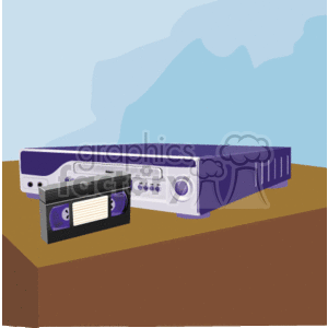 The image is a clipart representation of a purple and white VCR (video cassette recorder) sitting on a brown surface, possibly a table or shelf. In front of the VCR is a VHS tape, partially ejected from the player. The scene is set against a blue background with an abstract white pattern that could be interpreted as a wall decoration or reflections.