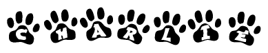 The image shows a row of animal paw prints, each containing a letter. The letters spell out the word Charlie within the paw prints.