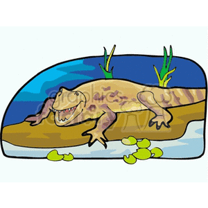 The clipart image features a cartoon representation of an alligator or crocodile resting on a sandy shore near water, with some green aquatic plants both behind it on the bank and floating in the water in the foreground.