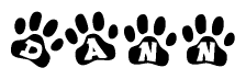 The image shows a series of animal paw prints arranged in a horizontal line. Each paw print contains a letter, and together they spell out the word Dann.