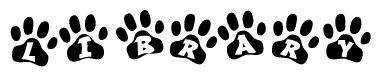 The image shows a row of animal paw prints, each containing a letter. The letters spell out the word Library within the paw prints.