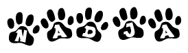 The image shows a row of animal paw prints, each containing a letter. The letters spell out the word Nadja within the paw prints.