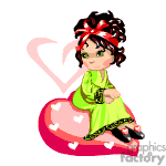 The image is a clipart featuring a cartoon girl with dark hair tied up with a red bow, wearing a green dress, sitting on a pink heart. There are smaller hearts around her and one large heart in the background that seems to partially frame her. The girl is illustrated with a cute, stylized appearance.