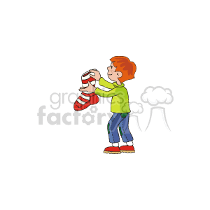 The clipart image depicts a young boy with red hair, wearing a green long-sleeve shirt, blue jeans, and red and white sneakers. He is holding a red and white striped Christmas stocking that appears to be filled with gifts or presents. The boy looks cheerful and seems to be enjoying the holiday spirit.