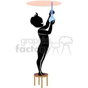 Person standing on a chair changing a lightbulb