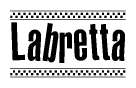 The clipart image displays the text Labretta in a bold, stylized font. It is enclosed in a rectangular border with a checkerboard pattern running below and above the text, similar to a finish line in racing. 