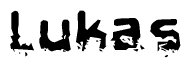 The image contains the word Lukas in a stylized font with a static looking effect at the bottom of the words
