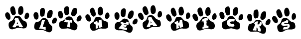 The image shows a series of animal paw prints arranged in a horizontal line. Each paw print contains a letter, and together they spell out the word Altheahicks.