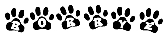 The image shows a series of animal paw prints arranged in a horizontal line. Each paw print contains a letter, and together they spell out the word Bobbye.