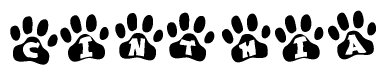 The image shows a series of animal paw prints arranged horizontally. Within each paw print, there's a letter; together they spell Cinthia