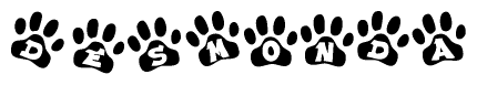 The image shows a row of animal paw prints, each containing a letter. The letters spell out the word Desmonda within the paw prints.