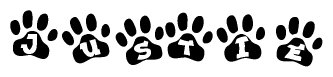 The image shows a row of animal paw prints, each containing a letter. The letters spell out the word Justie within the paw prints.