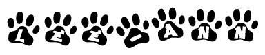 The image shows a series of animal paw prints arranged in a horizontal line. Each paw print contains a letter, and together they spell out the word Lee-ann.
