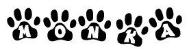 The image shows a series of animal paw prints arranged in a horizontal line. Each paw print contains a letter, and together they spell out the word Monka.