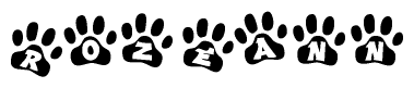 The image shows a series of animal paw prints arranged in a horizontal line. Each paw print contains a letter, and together they spell out the word Rozeann.