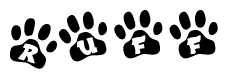 The image shows a series of animal paw prints arranged in a horizontal line. Each paw print contains a letter, and together they spell out the word Ruff.
