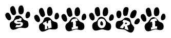 The image shows a series of animal paw prints arranged in a horizontal line. Each paw print contains a letter, and together they spell out the word Shiori.