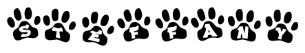 The image shows a series of animal paw prints arranged in a horizontal line. Each paw print contains a letter, and together they spell out the word Steffany.