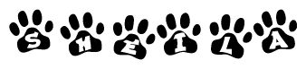 The image shows a series of animal paw prints arranged in a horizontal line. Each paw print contains a letter, and together they spell out the word Sheila.