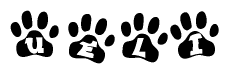The image shows a row of animal paw prints, each containing a letter. The letters spell out the word Ueli within the paw prints.