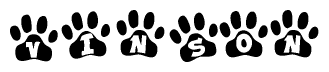 The image shows a series of animal paw prints arranged in a horizontal line. Each paw print contains a letter, and together they spell out the word Vinson.