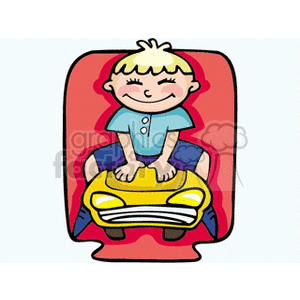 Little boy riding a toy car