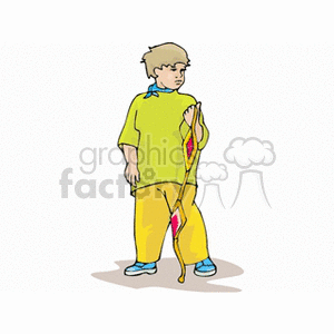 Boy standing with a toy