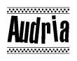 The clipart image displays the text Audria in a bold, stylized font. It is enclosed in a rectangular border with a checkerboard pattern running below and above the text, similar to a finish line in racing. 