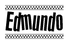 The image is a black and white clipart of the text Edmundo in a bold, italicized font. The text is bordered by a dotted line on the top and bottom, and there are checkered flags positioned at both ends of the text, usually associated with racing or finishing lines.