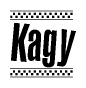 The image is a black and white clipart of the text Kagy in a bold, italicized font. The text is bordered by a dotted line on the top and bottom, and there are checkered flags positioned at both ends of the text, usually associated with racing or finishing lines.