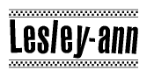 The clipart image displays the text Lesley-ann in a bold, stylized font. It is enclosed in a rectangular border with a checkerboard pattern running below and above the text, similar to a finish line in racing. 