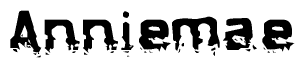 The image contains the word Anniemae in a stylized font with a static looking effect at the bottom of the words