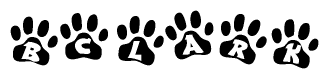 The image shows a series of animal paw prints arranged in a horizontal line. Each paw print contains a letter, and together they spell out the word Bclark.