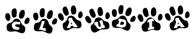 The image shows a series of animal paw prints arranged in a horizontal line. Each paw print contains a letter, and together they spell out the word Claudia.