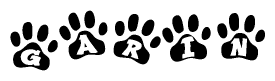 The image shows a series of animal paw prints arranged in a horizontal line. Each paw print contains a letter, and together they spell out the word Garin.