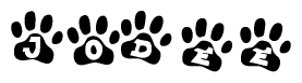 The image shows a series of animal paw prints arranged in a horizontal line. Each paw print contains a letter, and together they spell out the word Jodee.