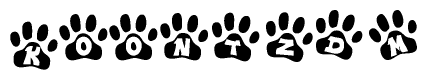 The image shows a row of animal paw prints, each containing a letter. The letters spell out the word Koontzdm within the paw prints.