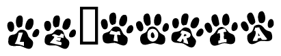 The image shows a series of animal paw prints arranged horizontally. Within each paw print, there's a letter; together they spell Le toria