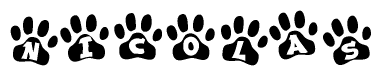 The image shows a row of animal paw prints, each containing a letter. The letters spell out the word Nicolas within the paw prints.