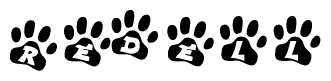 The image shows a row of animal paw prints, each containing a letter. The letters spell out the word Redell within the paw prints.